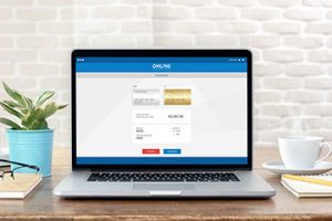 Laptop displaying online banking accounts