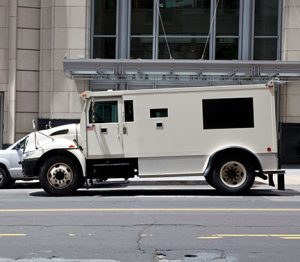 Armored car parked in front of office