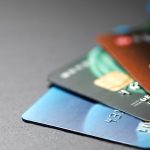 Array of credit cards on table