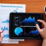 Tablet displaying financial performance data