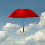 Red Umbrella on Cloud Background