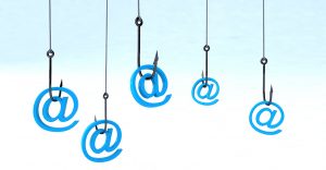 floating at symbols with hooks symbolizing phishing