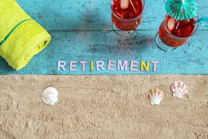 Retirement spelled out on the beach