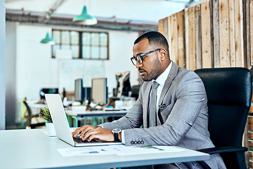 businessman using laptop in office