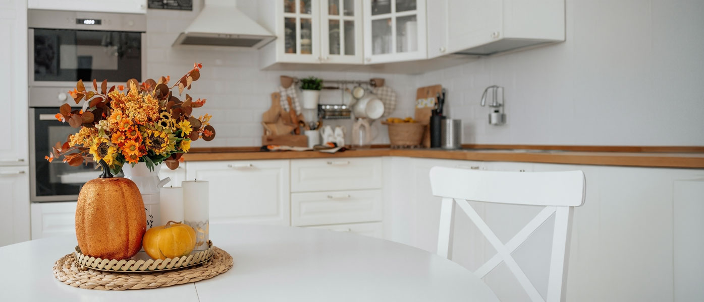 Modern kitchen with fall decor on table