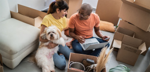 Latino Couple with Dog Moved into New House