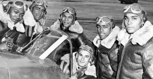 The traveling RISE ABOVE exhibit. which tells the story of the Tuskegee Airmen (pictured) and the Women Airforce Service Pilots (WASP), is coming to the Manassas Airport from August 21-27 thanks, in part, to John Marshall Bank.
