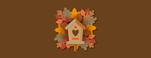 Illustration of birds nest surrounded by fall leaves