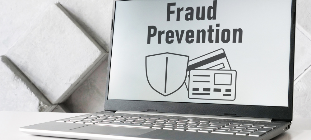 Fraud Prevention Message on Laptop