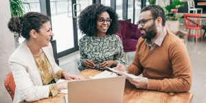 small business owners with loan officer