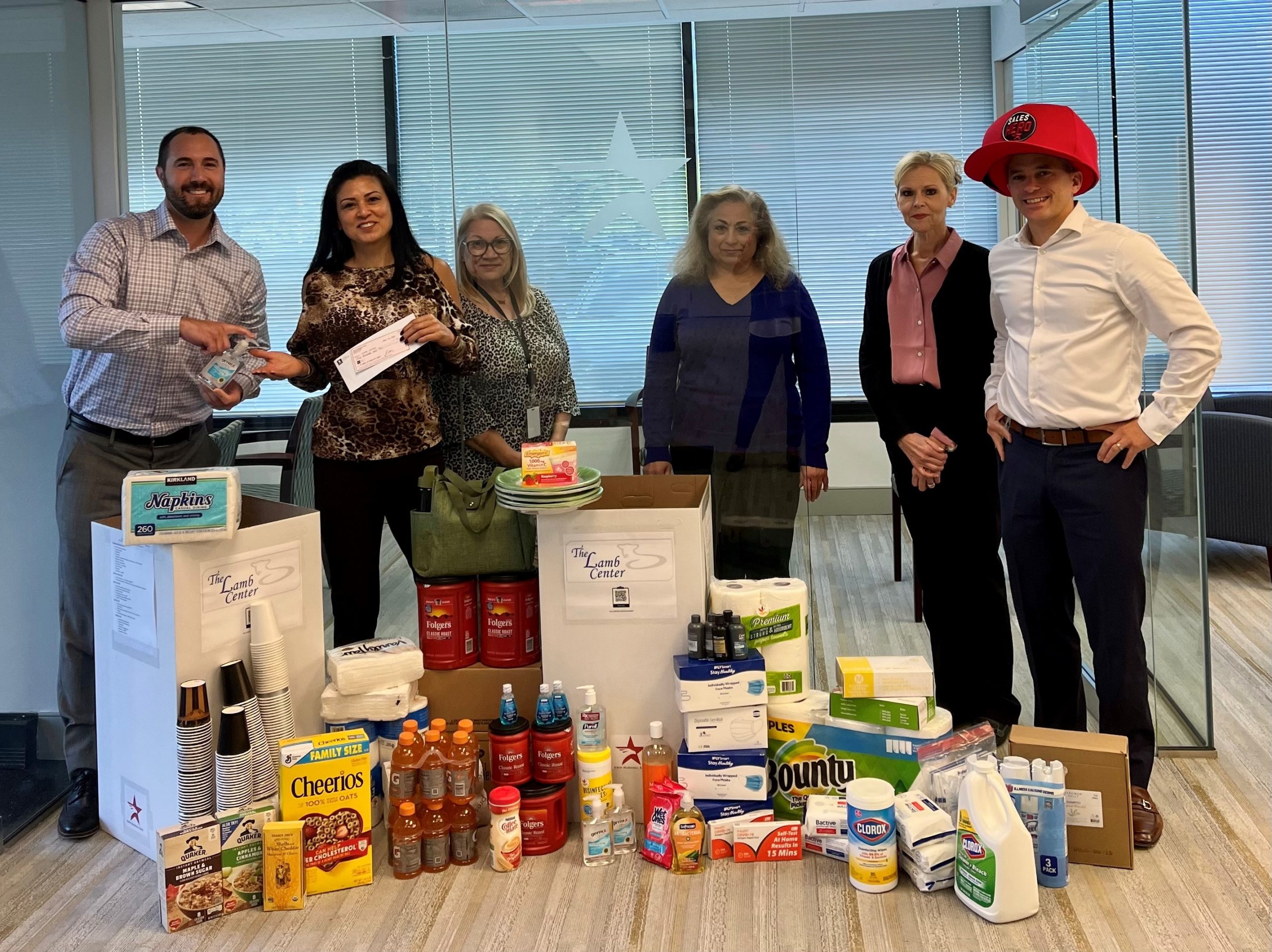 JMB's Fairfax Team with goods they collected for The Lamb Center