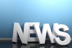3D News Letters propped against wall
