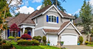 Single Family Home with blue shudders in springtime