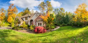Single Family House surrounded by fall foliage